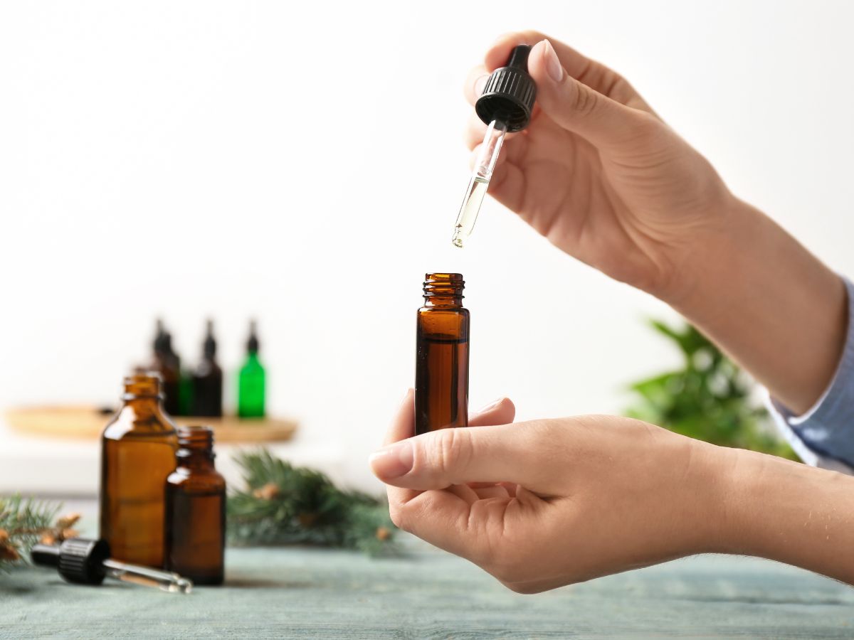 Essential Oil Bottle with Hand